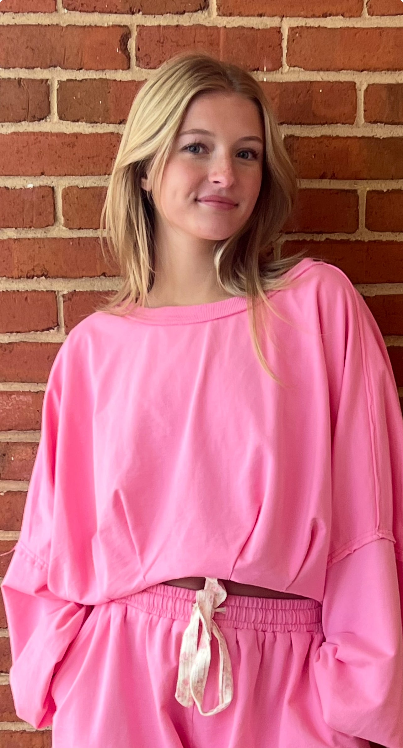 PINK CROPPED BUBBLE HEM SWEATSHIRT by Peach Love