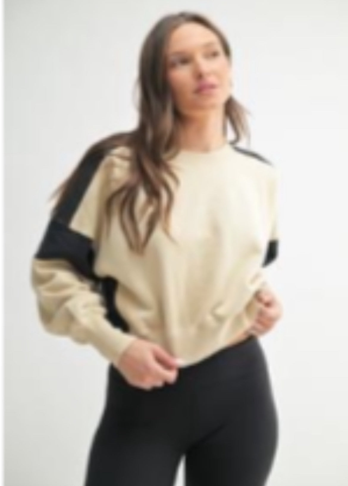 Bone and black color block oversized sweatshirt with long sleeves.
