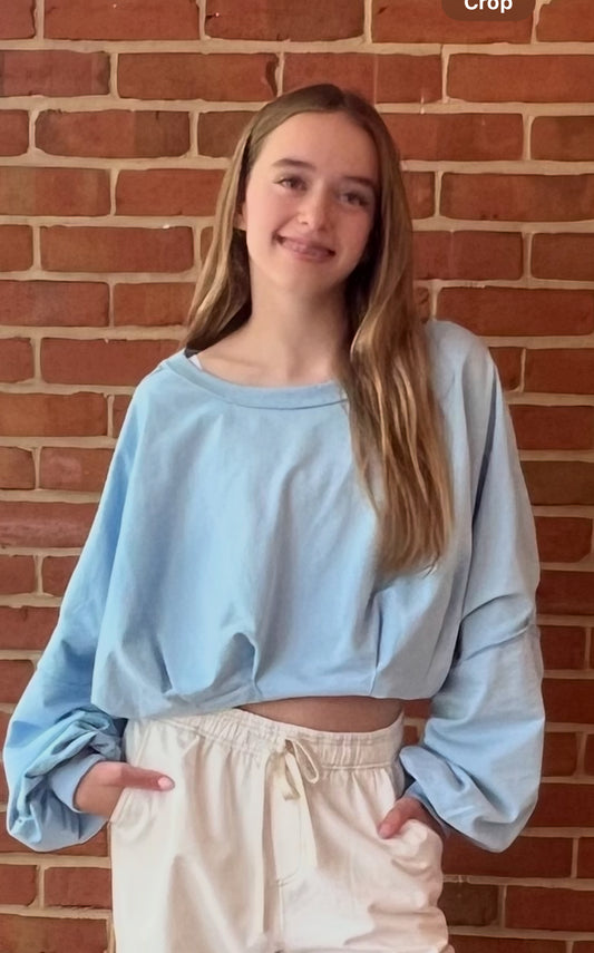 LIGHT BLUE CROPPED BUBBLE HEM SWEATSHIRT by Peach Love